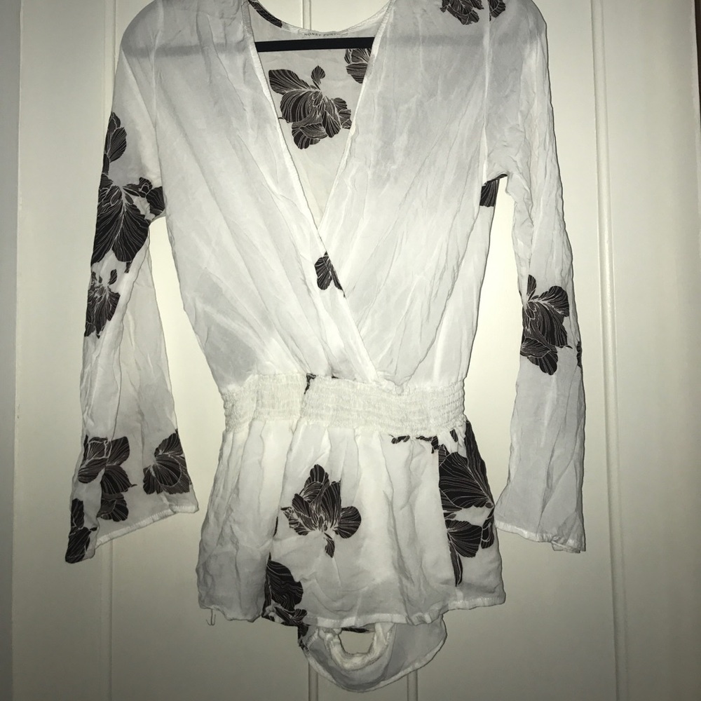 Super cute white and flower romper